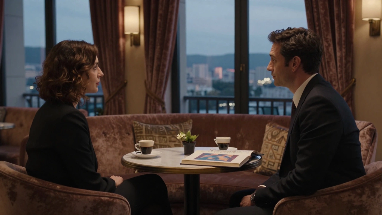 Two people meet discreetly in a luxurious hotel lounge, engaged in thoughtful conversation over coffee.